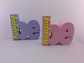 bymelli schriftzug "be happy" wohn deko aus dem 3d-druck in lila und rosa